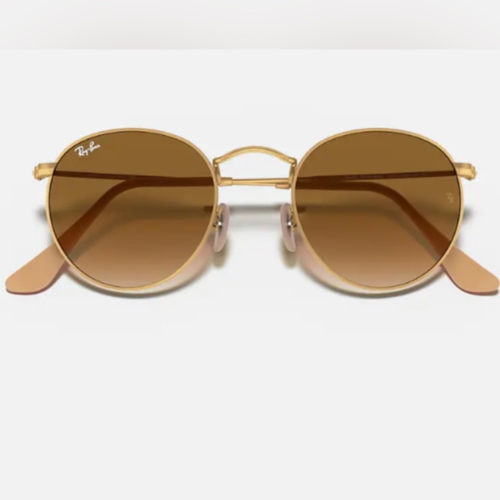 Womens Ray Ban sunglasses. Round shape. Gold. Worn once.